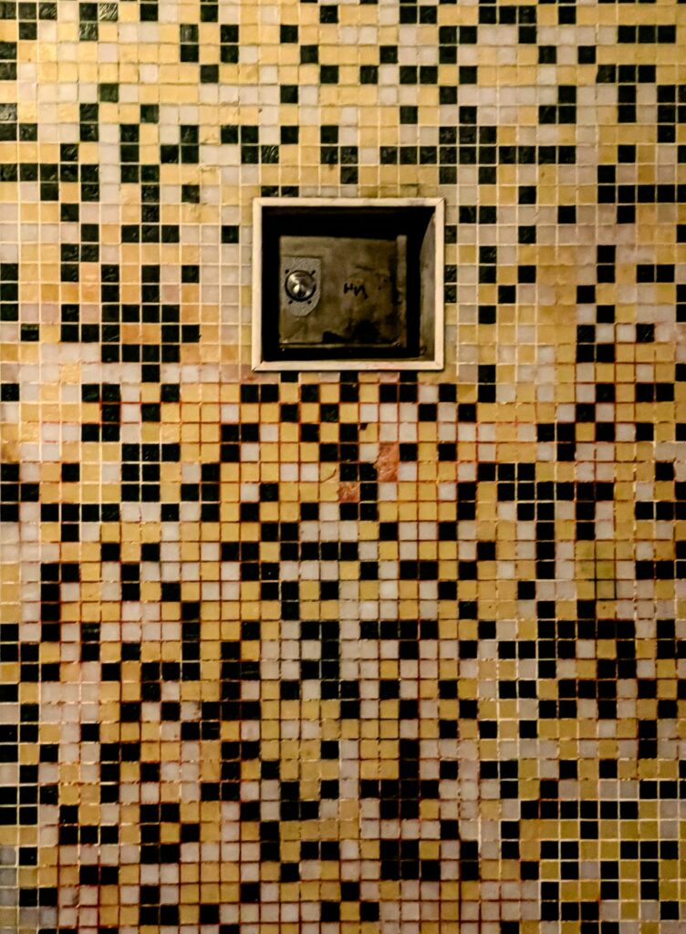 Mosaic tile wall with recessed niche — professional tile installation by Florico Design South Florida